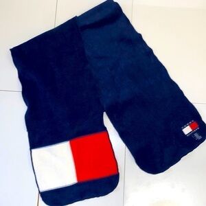 Tommy Hilfiger men’s navy with white/ red logo polyester fleece scarf. 9” by 58”